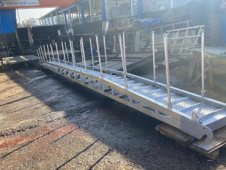 Adjustable ship gangway installed on deck for crew access